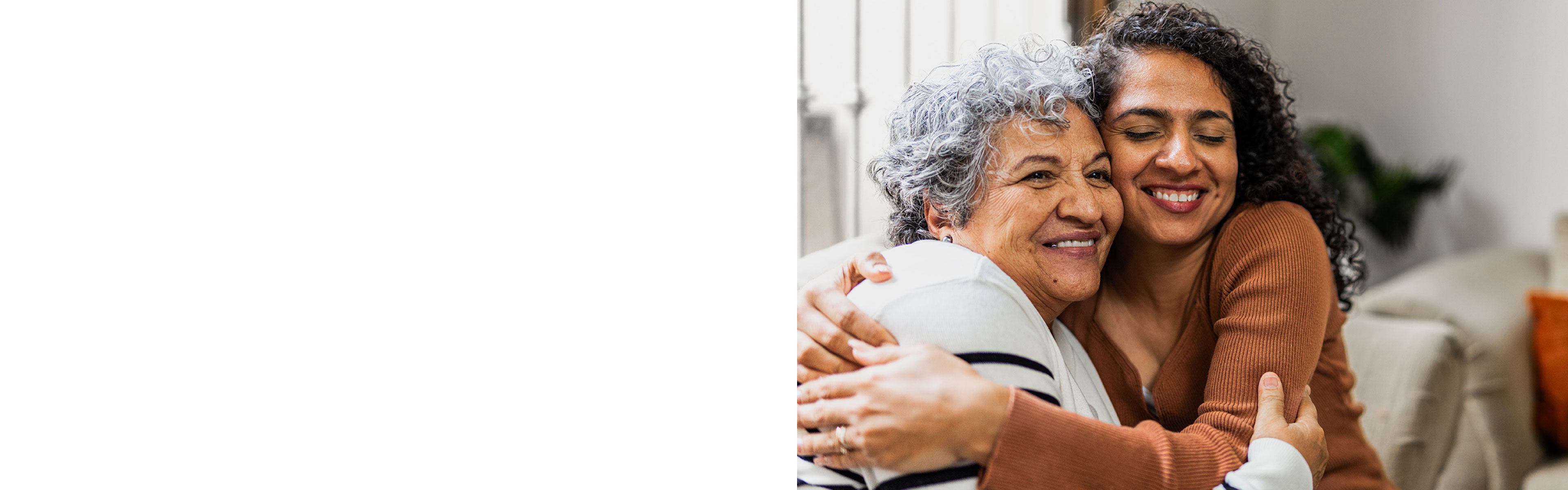 An older couple embracing